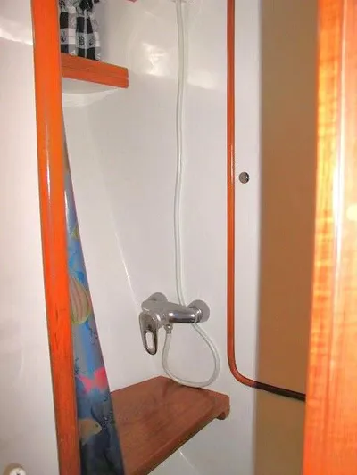 Peregrine Yacht Photos Pics Shower area in 2002 Tayana 460 Vancouver Pilothouse yacht with wooden accents.