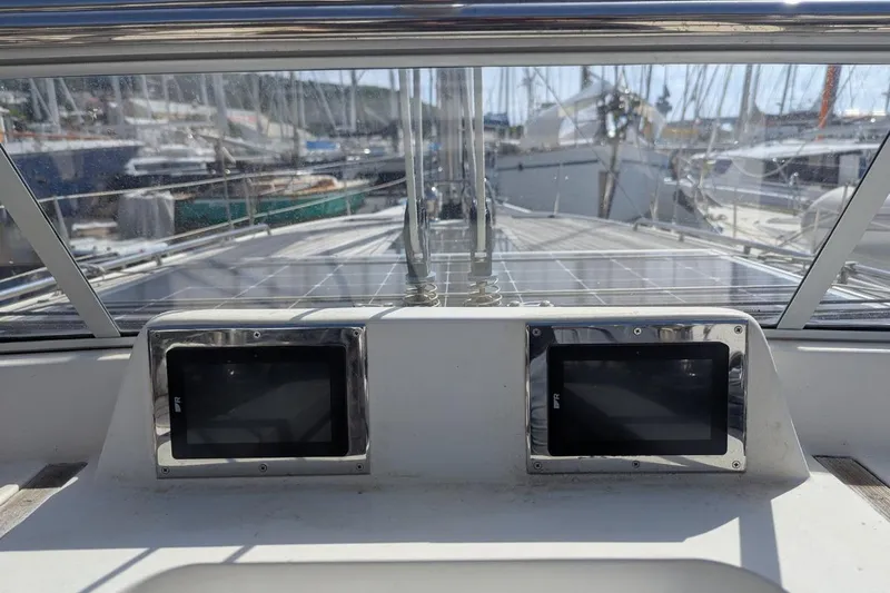 Muchacha De Abril Yacht Photos Pics 2017 X-Yachts Xc 45 yacht cockpit with navigation displays, docked in a marina.