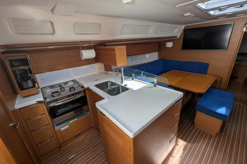 Muchacha De Abril Yacht Photos Pics 2017 X-Yachts Xc 45 yacht interior with kitchen, dining area, and modern amenities.