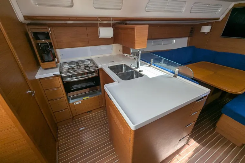 Muchacha De Abril Yacht Photos Pics 2017 X-Yachts Xc 45 yacht interior with modern kitchen and dining area.