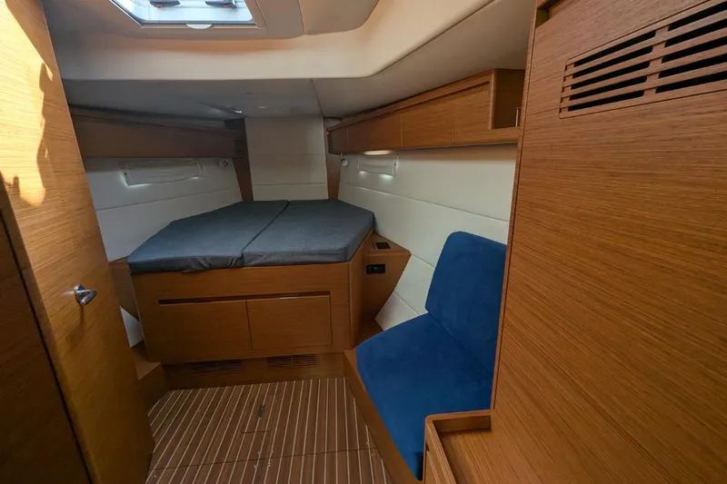 Muchacha De Abril Yacht Photos Pics Interior of 2017 X-Yachts Xc 45, featuring a cozy cabin with wooden finishes.