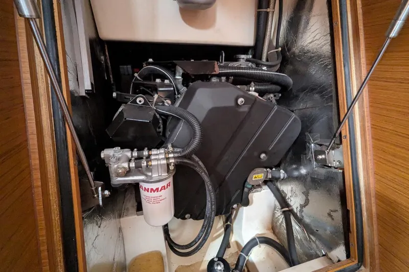 Muchacha De Abril Yacht Photos Pics Engine compartment of 2017 X-Yachts Xc 45 sailboat with Yanmar filter visible.