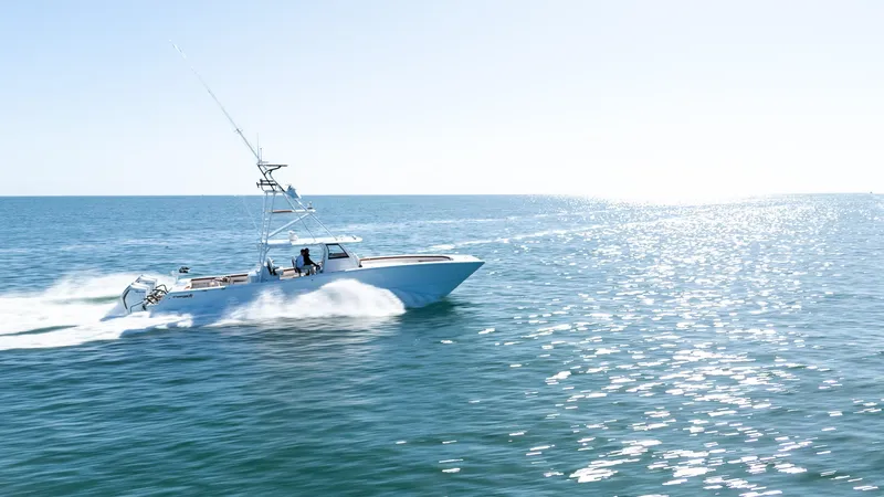  Yacht Photos Pics Freeman 47 boat cruising on open water, 2022 model.