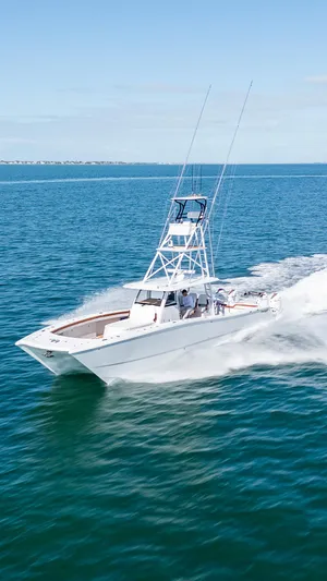  Yacht Photos Pics 2022 Freeman 47 boat cruising on open water.