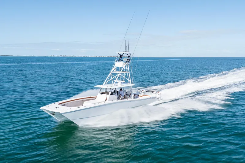  Yacht Photos Pics 2022 Freeman 47 boat cruising on open water.