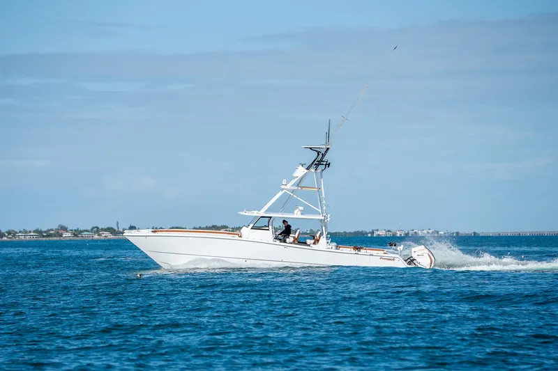  Yacht Photos Pics 2022 Freeman 47 boat cruising on open water.