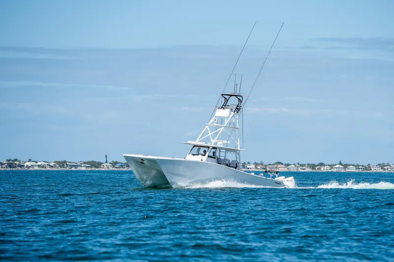  Yacht Photos Pics 2022 Freeman 47 boat cruising on open water.