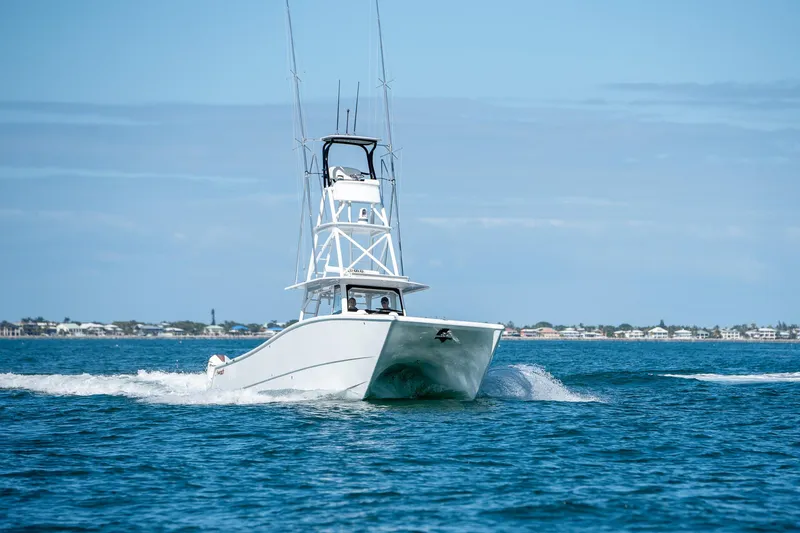  Yacht Photos Pics 2022 Freeman 47 boat cruising on open water.