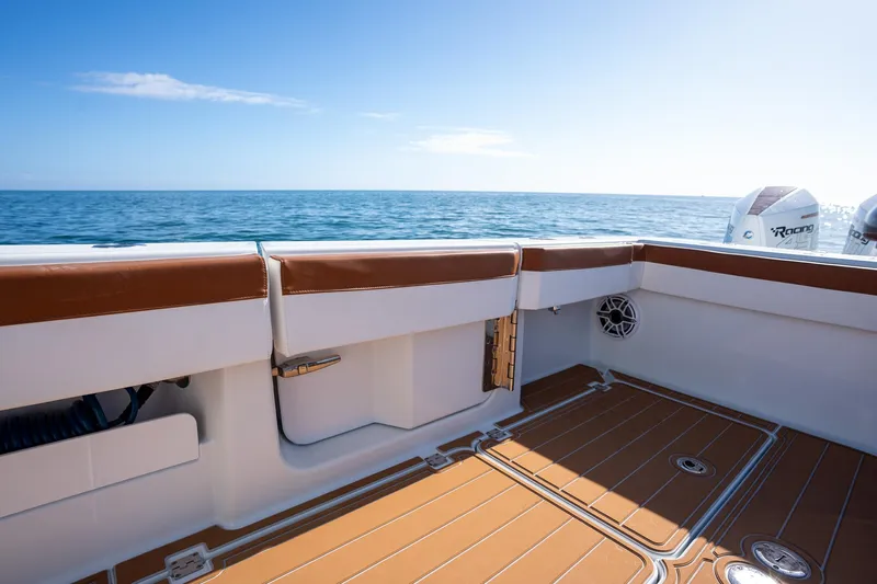  Yacht Photos Pics Freeman 47 boat deck, 2022 model, with ocean view and clear sky.