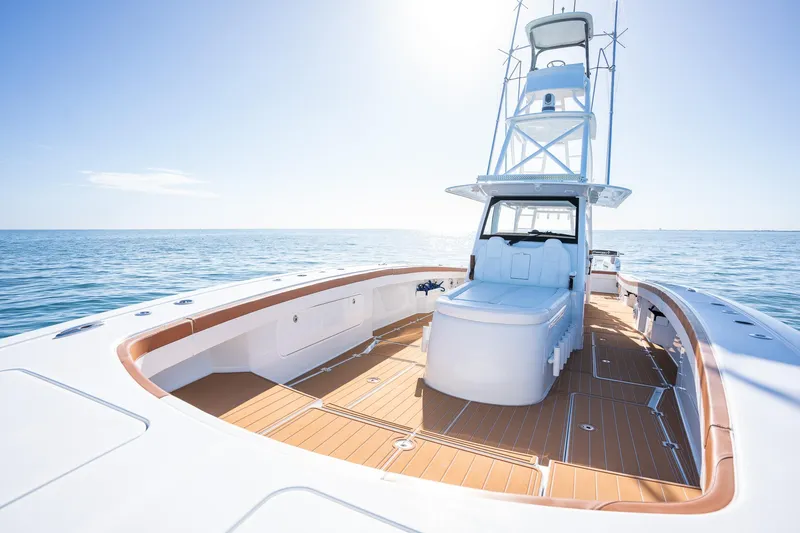  Yacht Photos Pics Freeman 47 boat 2022 model on open water with clear blue sky.