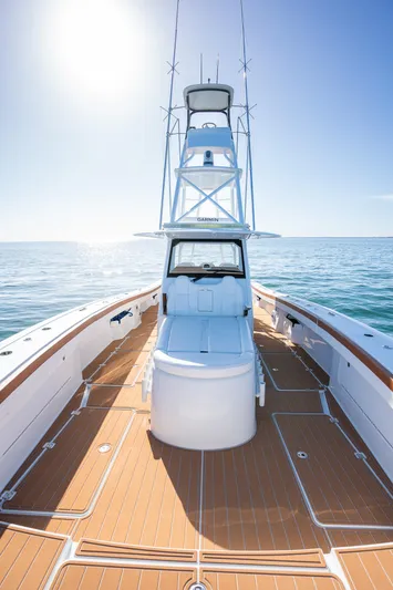  Yacht Photos Pics 2022 Freeman 47 boat on open water, sunny day, clear sky.