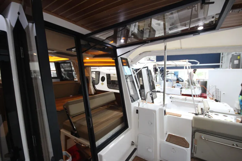 Patrick Mcginty Yacht Photos Pics 2022 Ranger Tugs R-29 Sedan Luxury Edition interior with modern seating and sleek design.
