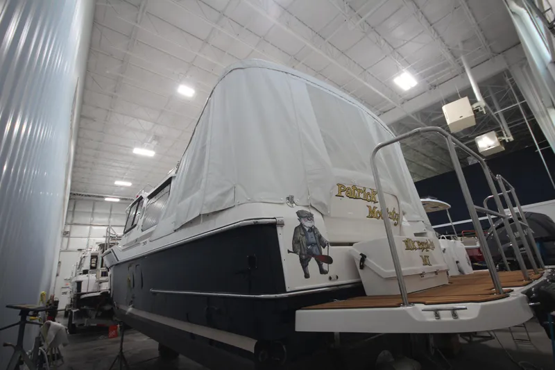 Patrick Mcginty Yacht Photos Pics 2022 Ranger Tugs R-29 Sedan Luxury Edition boat in indoor storage.