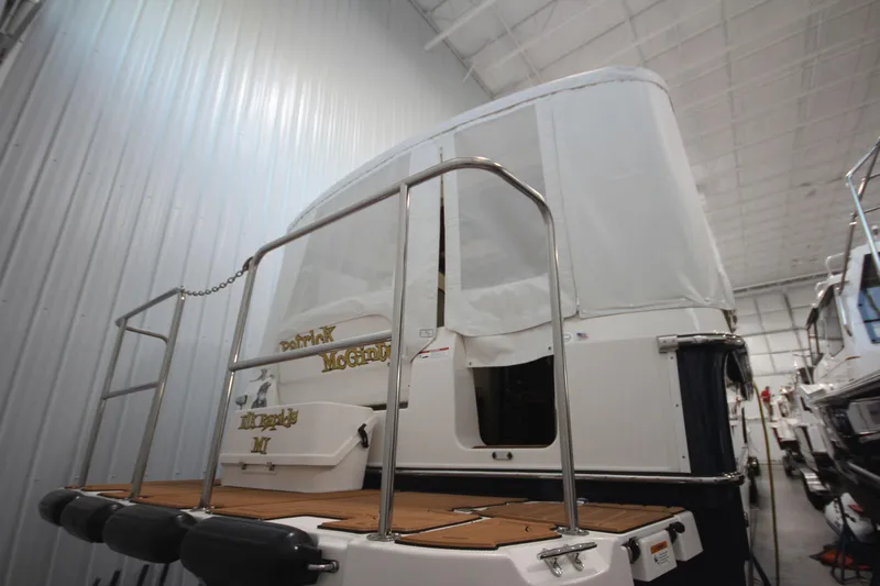 Patrick Mcginty Yacht Photos Pics 2022 Ranger Tugs R-29 Sedan Luxury Edition in a storage facility.