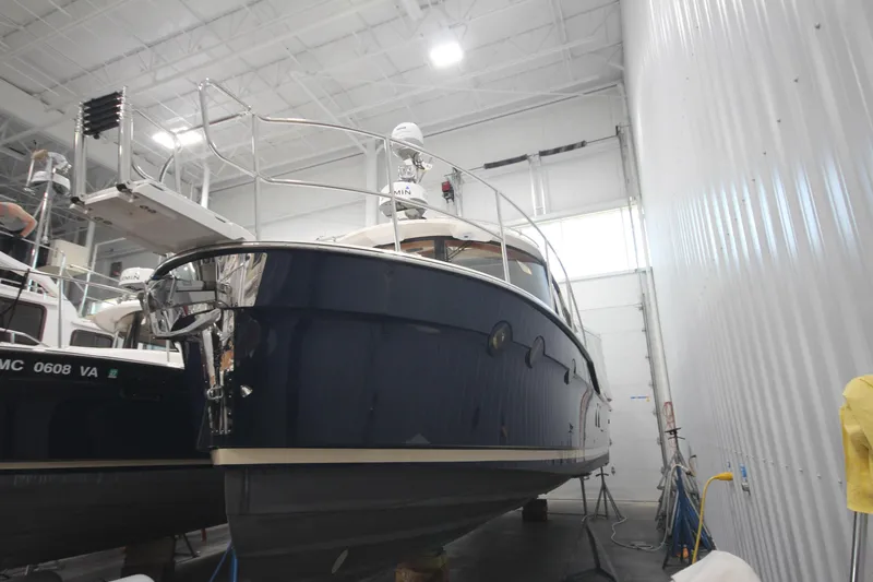 Patrick Mcginty Yacht Photos Pics 2022 Ranger Tugs R-29 Sedan Luxury Edition in indoor storage facility.