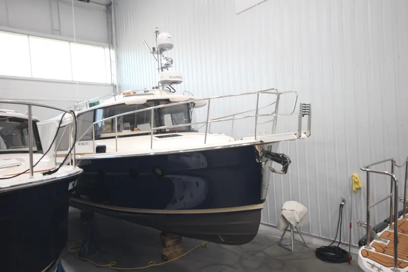 Patrick Mcginty Yacht Photos Pics 2022 Ranger Tugs R-29 Sedan Luxury Edition in indoor storage facility.