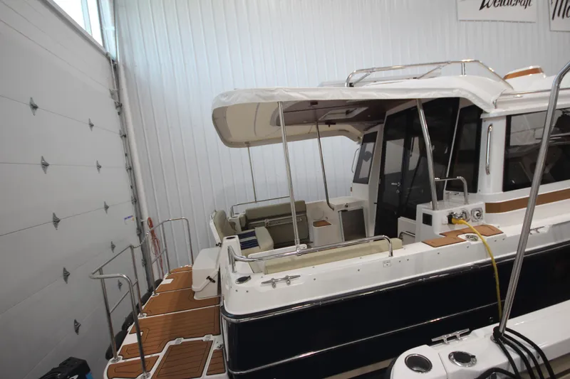Patrick Mcginty Yacht Photos Pics 2022 Ranger Tugs R-29 Sedan Luxury Edition in indoor storage facility.