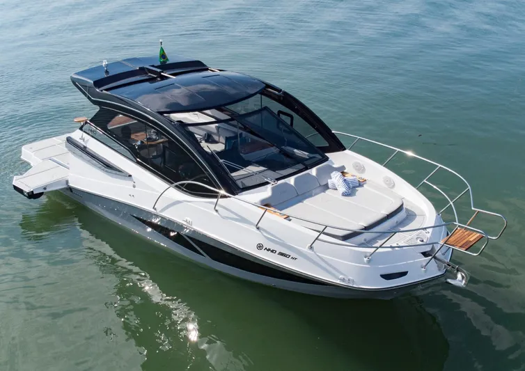  Yacht Photos Pics 2025 NHD 365 Open Deck HT luxury boat on calm water.