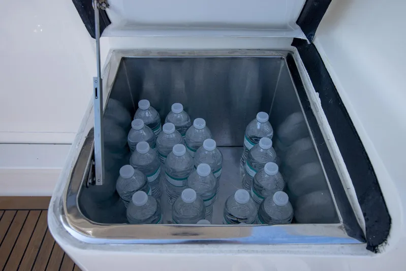 Scallywag Yacht Photos Pics Cooler with water bottles on 1991 Ocean Yachts 42 Super Sport boat.