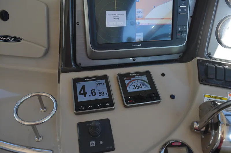 Knot On Call Yacht Photos Pics Control panel of 2007 Sea Ray 44 Sundancer with Raymarine navigation displays.