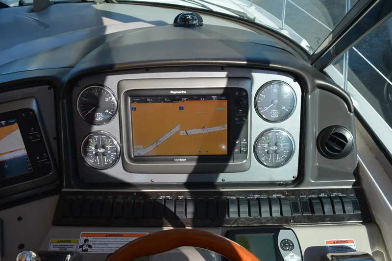 Knot On Call Yacht Photos Pics Dashboard of 2007 Sea Ray 44 Sundancer with navigation system and gauges.