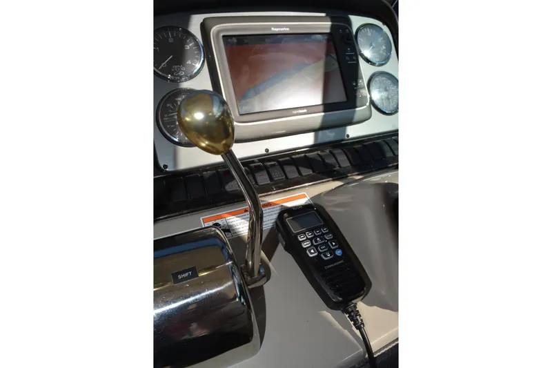 Knot On Call Yacht Photos Pics Control panel of 2007 Sea Ray 44 Sundancer with navigation screen and communication device.
