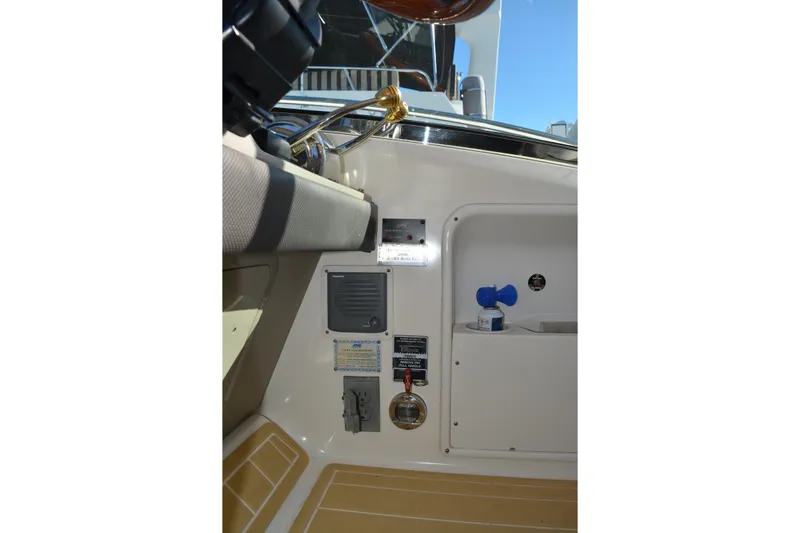 Knot On Call Yacht Photos Pics 2007 Sea Ray 44 Sundancer cockpit controls and storage compartment.