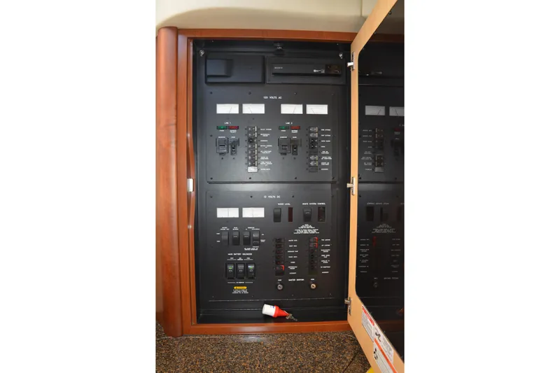 Knot On Call Yacht Photos Pics Electrical control panel inside a 2007 Sea Ray 44 Sundancer yacht.