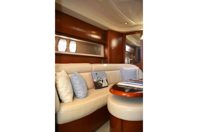 Knot On Call Yacht Photos Pics Luxurious interior of 2007 Sea Ray 44 Sundancer yacht with plush seating and elegant decor.