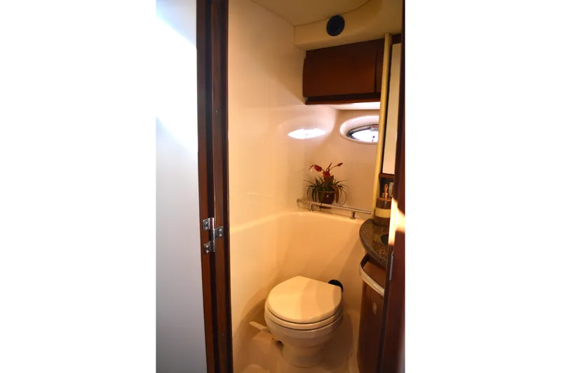 Knot On Call Yacht Photos Pics Luxurious bathroom in 2007 Sea Ray 44 Sundancer yacht with modern amenities.