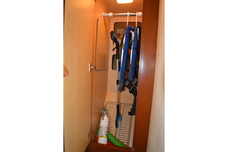 Knot On Call Yacht Photos Pics 2007 Sea Ray 44 Sundancer closet with life jackets and fire extinguisher.
