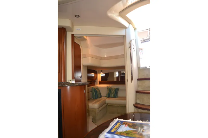 Knot On Call Yacht Photos Pics Interior of 2007 Sea Ray 44 Sundancer yacht with elegant seating and wooden finishes.