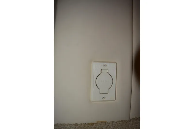 Knot On Call Yacht Photos Pics Electrical outlet on 2007 Sea Ray 44 Sundancer yacht interior wall.