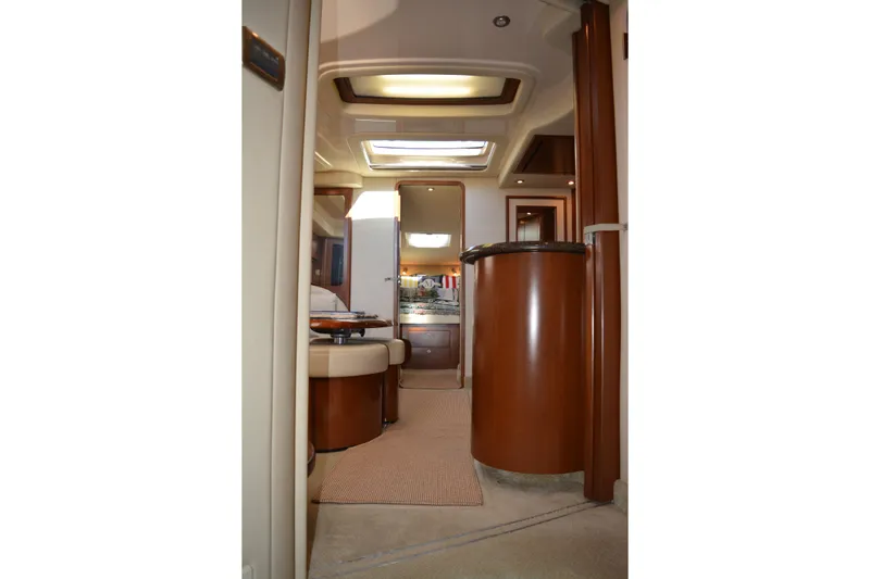 Knot On Call Yacht Photos Pics Interior of 2007 Sea Ray 44 Sundancer yacht, featuring elegant wood finishes and modern design.