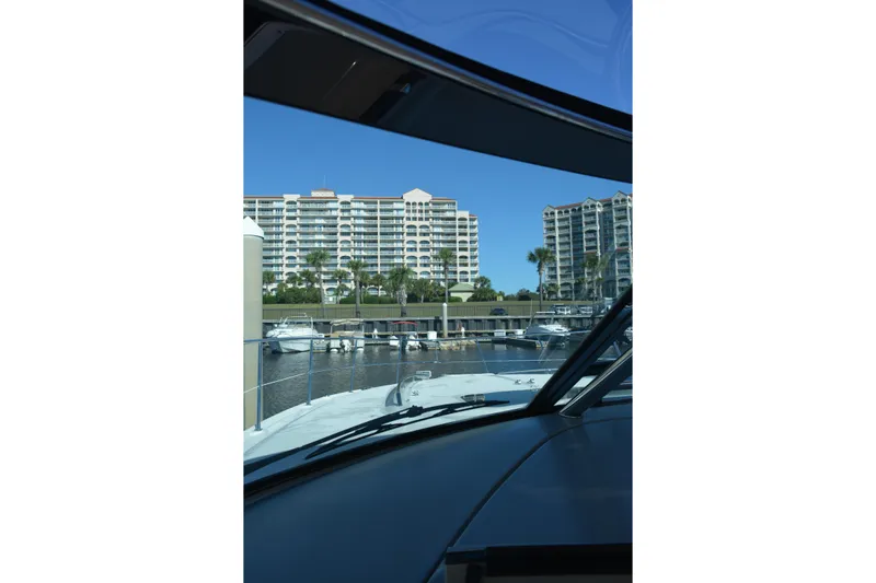 Knot On Call Yacht Photos Pics View from 2007 Sea Ray 44 Sundancer yacht, overlooking marina and waterfront buildings.