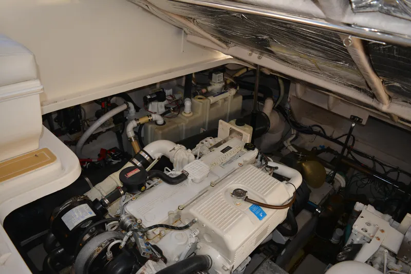 Knot On Call Yacht Photos Pics Engine room of 2007 Sea Ray 44 Sundancer, showcasing mechanical components and wiring.