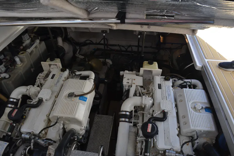 Knot On Call Yacht Photos Pics Engine compartment of a 2007 Sea Ray 44 Sundancer boat, showcasing dual engines.