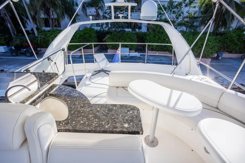  Yacht Photos Pics Luxurious 2001 Cruisers Yachts 5000 Sedan Sport with elegant seating and sleek design.