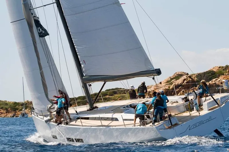 Nausicaä Yacht Photos Pics Sailing on a 2019 Solaris Yachts 55, crew navigating coastal waters.
