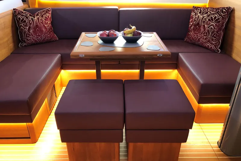 Nausicaä Yacht Photos Pics Luxurious interior of 2019 Solaris Yachts 55 with elegant seating and ambient lighting.