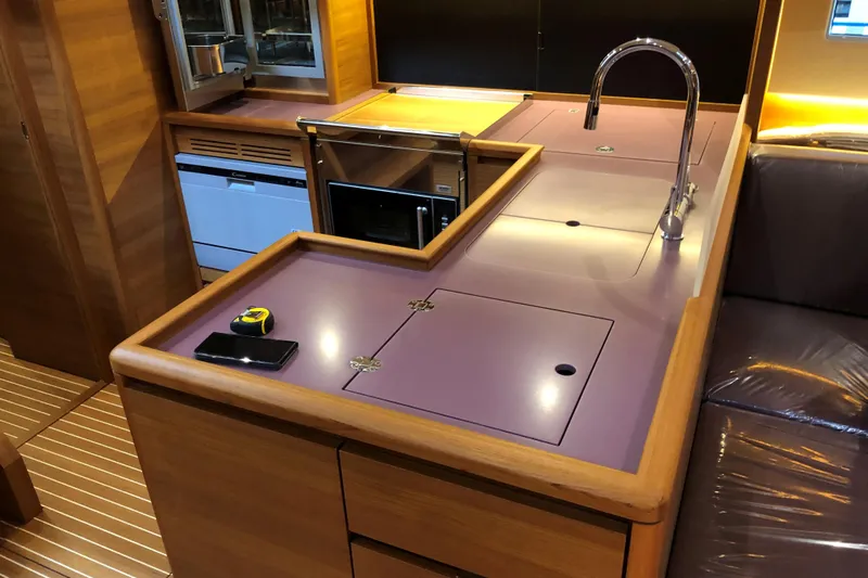 Nausicaä Yacht Photos Pics Luxurious 2019 Solaris Yachts 55 interior kitchen with modern appliances and sleek design.