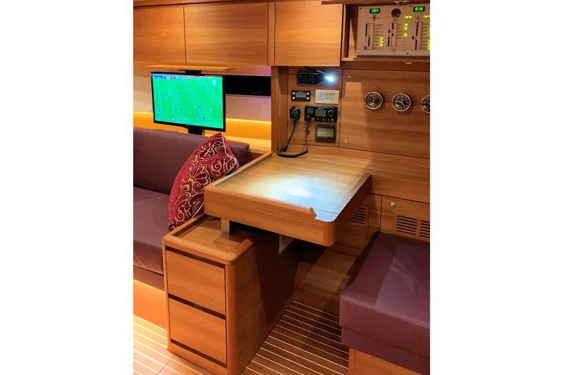 Nausicaä Yacht Photos Pics Luxurious interior of 2019 Solaris Yachts 55 with wood finish and modern amenities.