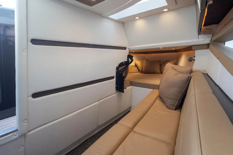 Rancho Agua Yacht Photos Pics Luxurious interior of 2021 Cobalt A36 boat with beige seating and modern lighting.