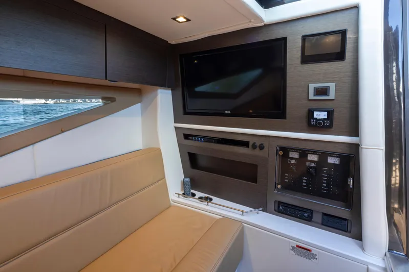 Rancho Agua Yacht Photos Pics Interior of 2021 Cobalt A36 boat with beige seating and modern entertainment system.