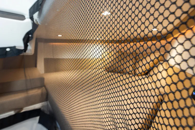 Rancho Agua Yacht Photos Pics Interior view of a 2021 Cobalt A36 boat, featuring a mesh partition.