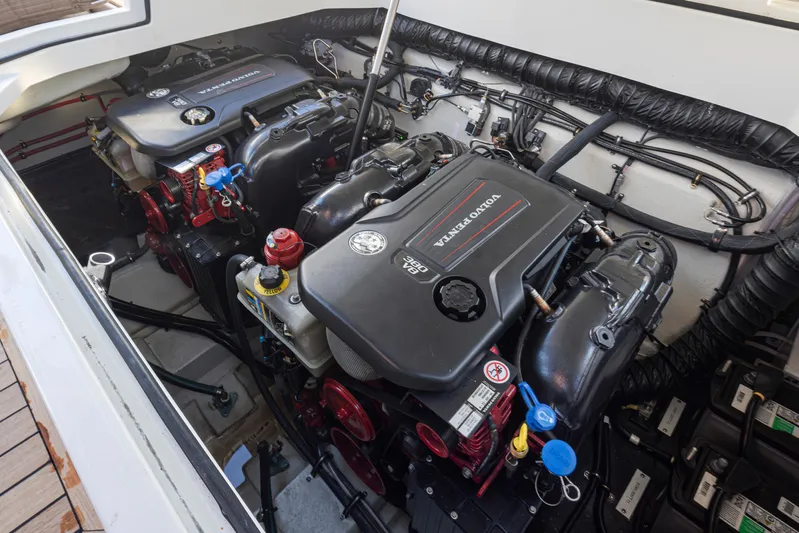 Rancho Agua Yacht Photos Pics Engine compartment of a 2021 Cobalt A36 boat, featuring dual inboard engines.