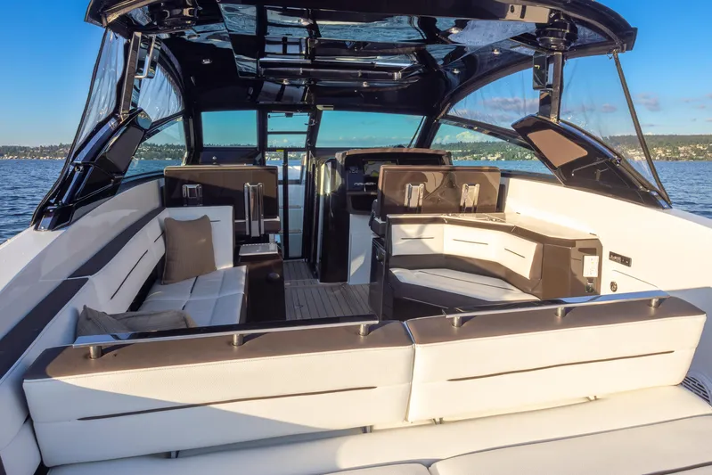 Rancho Agua Yacht Photos Pics 2021 Cobalt A36 boat interior with luxurious seating and modern design on open water.