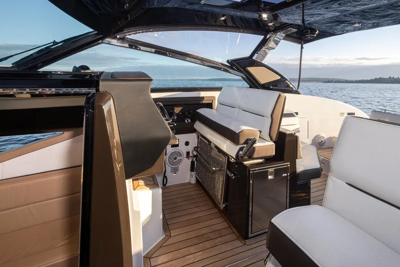 Rancho Agua Yacht Photos Pics 2021 Cobalt A36 boat interior with luxurious seating and modern design on open water.