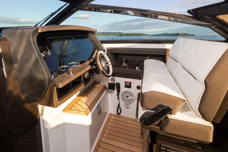 Rancho Agua Yacht Photos Pics 2021 Cobalt A36 boat interior with modern dashboard and comfortable seating.