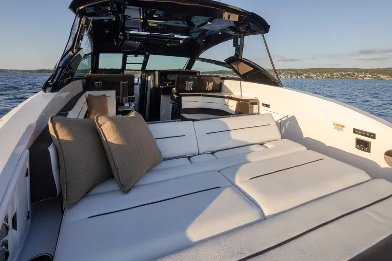 Rancho Agua Yacht Photos Pics 2021 Cobalt A36 luxury boat with spacious sunbathing deck on calm water.